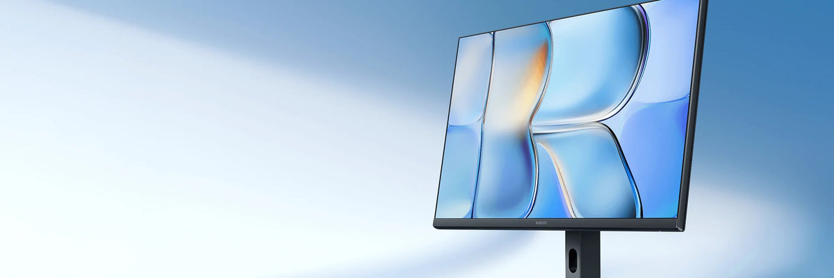 Xiaomi Monitor A27i 2026 in een lichte, blauwe ruimte met zonlicht
