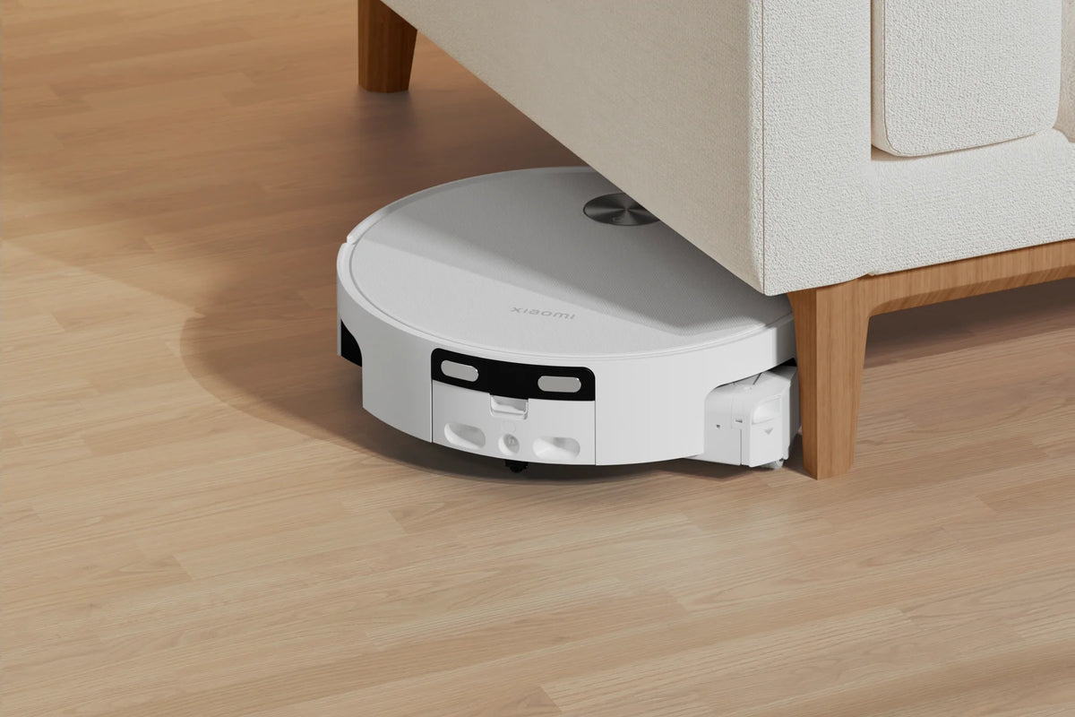 Xiaomi Robot Vacuum 6 rijdt onder de bank door, waar het meeste stof ligt